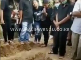 Dead Person Waves In a Coffin