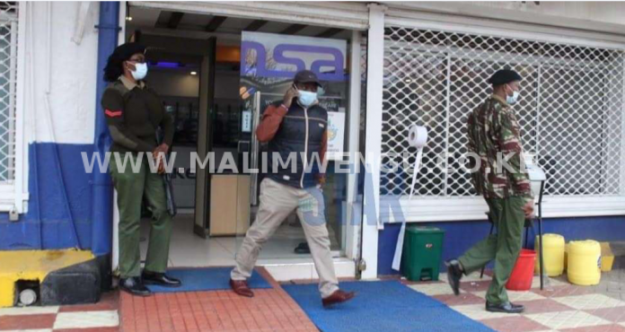 EACC officers at a raid