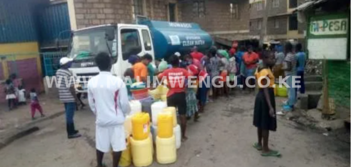 Residents queueing for water