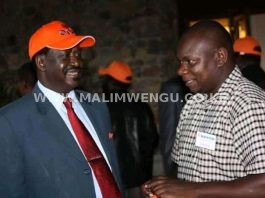 ODM Director Of Communication Philip Etale having a moment with Hon. Raila Odinga